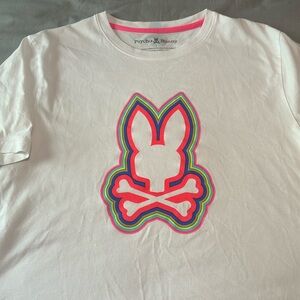 Psycho Bunny size 7 or Large, white T-shirt with logo.